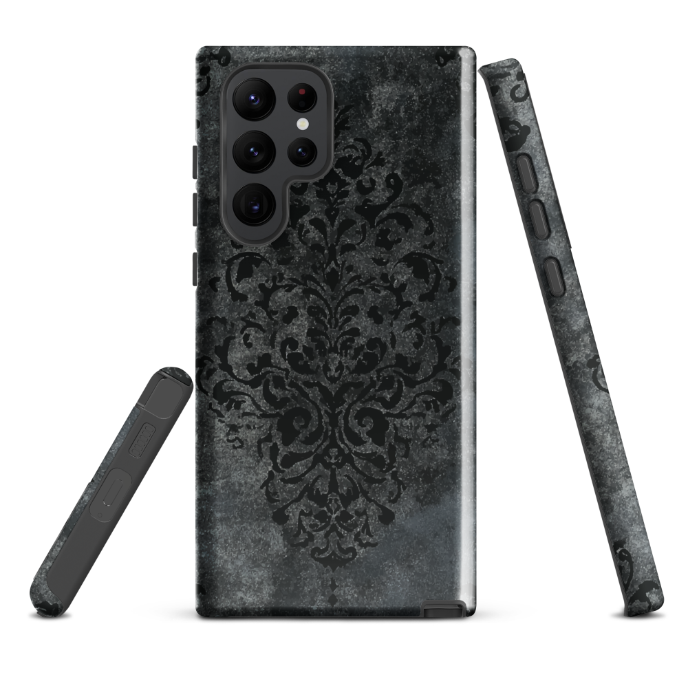 Dark damask patterned phone case with a vintage gothic aesthetic and textured stone background.