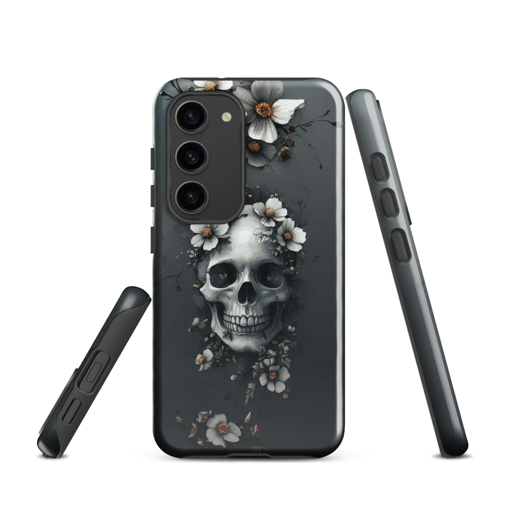 Gothic phone case with a floral skull design in grey tones, featuring white blossoms and dark detailing.