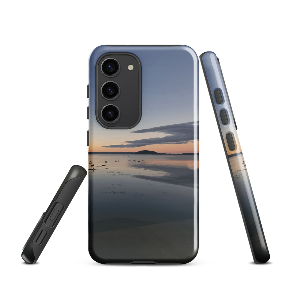 Phone case with tranquil lake scene at sunrise and distant hills.
