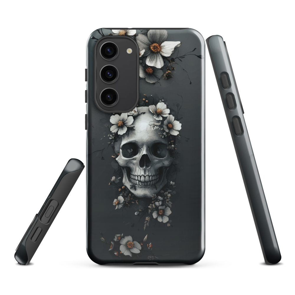 Gothic phone case with a floral skull design in grey tones, featuring white blossoms and dark detailing.