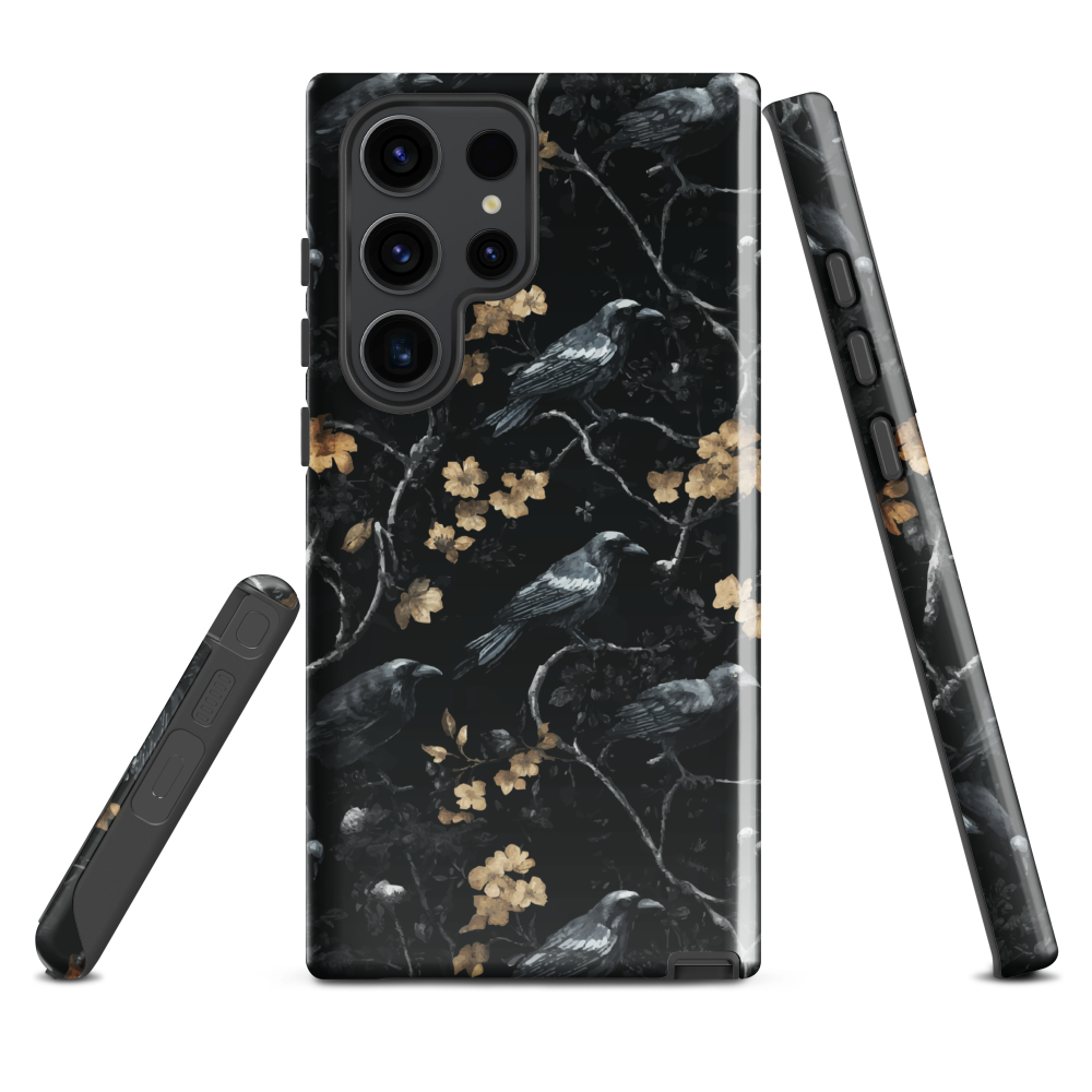 Dark phone case with blackbirds and gold blossoms on black branches.