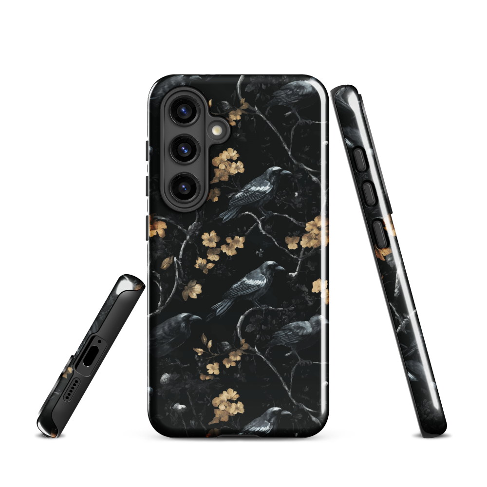 Dark phone case with blackbirds and gold blossoms on black branches.