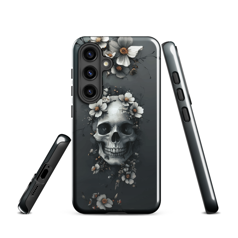 Gothic phone case with a floral skull design in grey tones, featuring white blossoms and dark detailing.