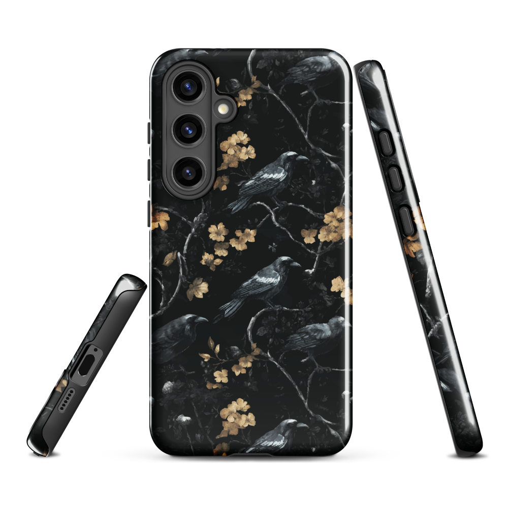 Dark phone case with blackbirds and gold blossoms on black branches.
