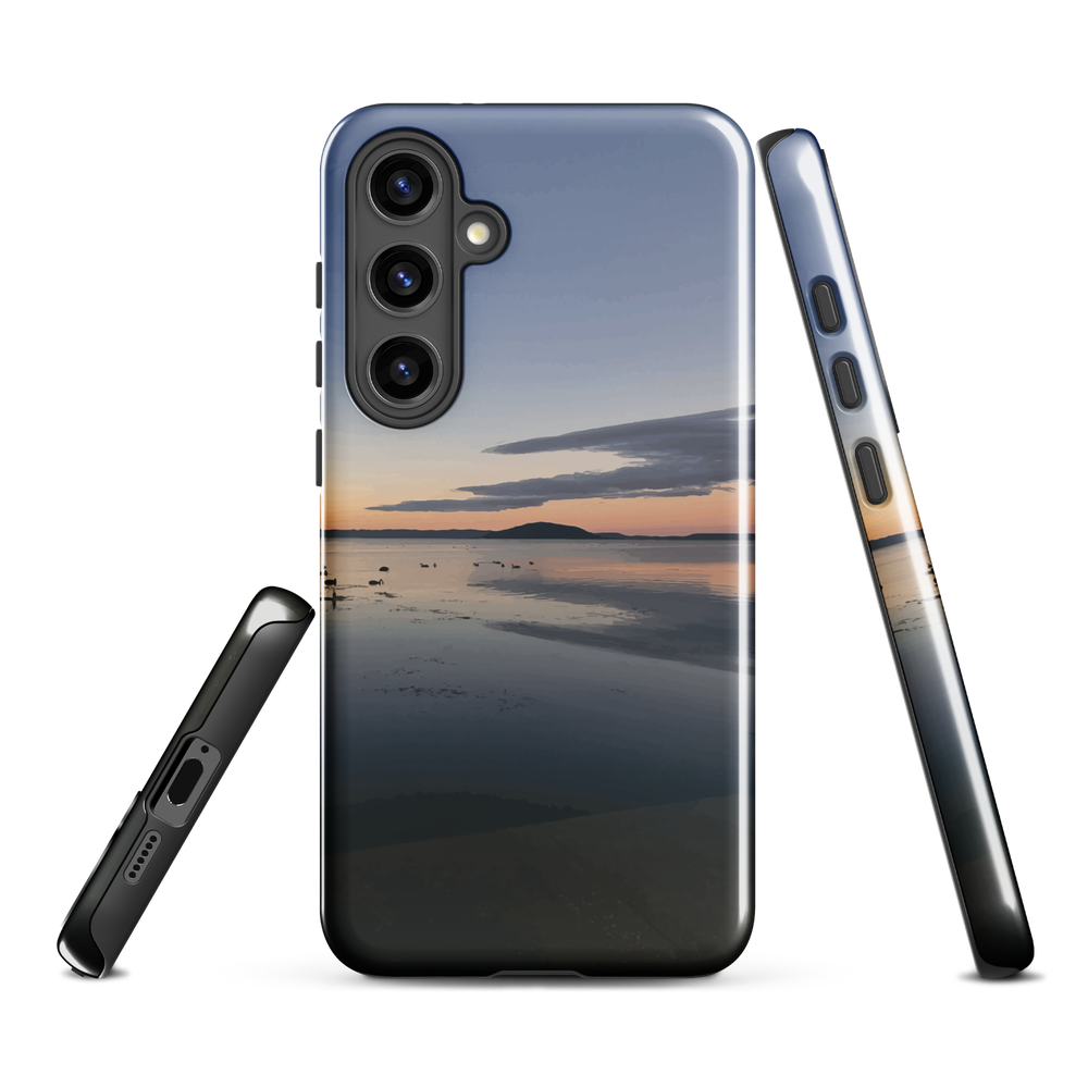 Phone case with tranquil lake scene at sunrise and distant hills.