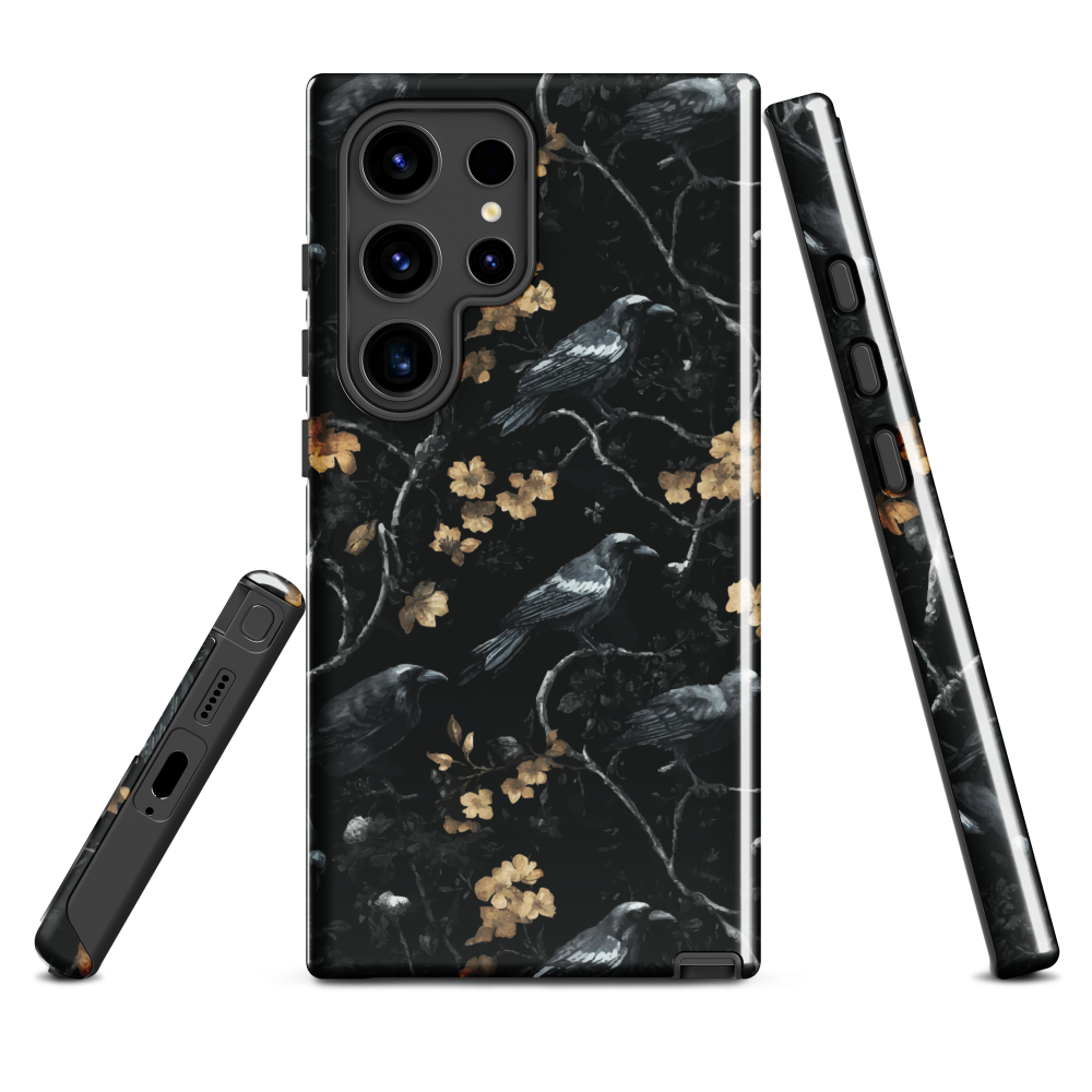 Dark phone case with blackbirds and gold blossoms on black branches.