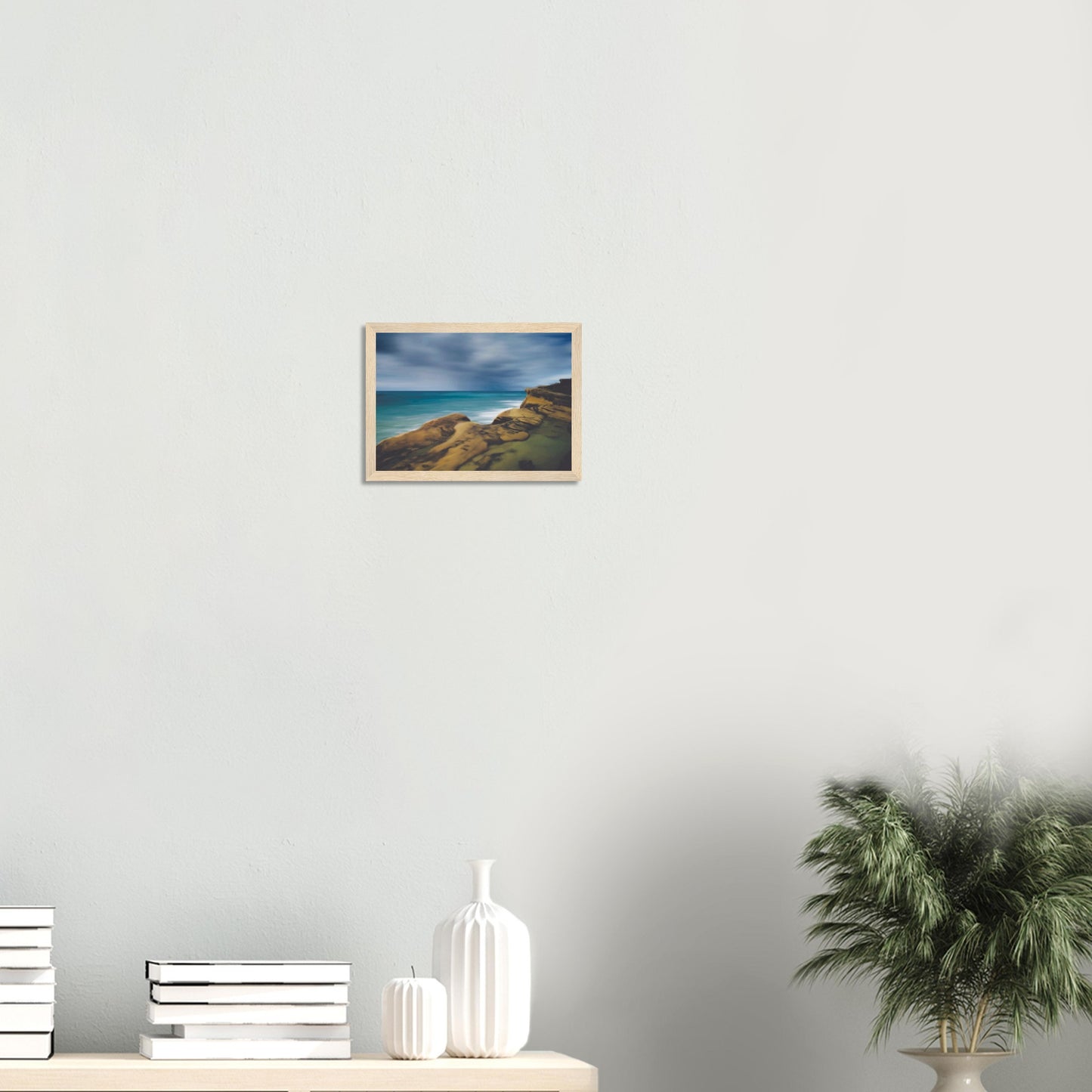 Moody seascape artwork of Castlepoint, with cliffs in the foreground and dark ocean under a brooding sky.
