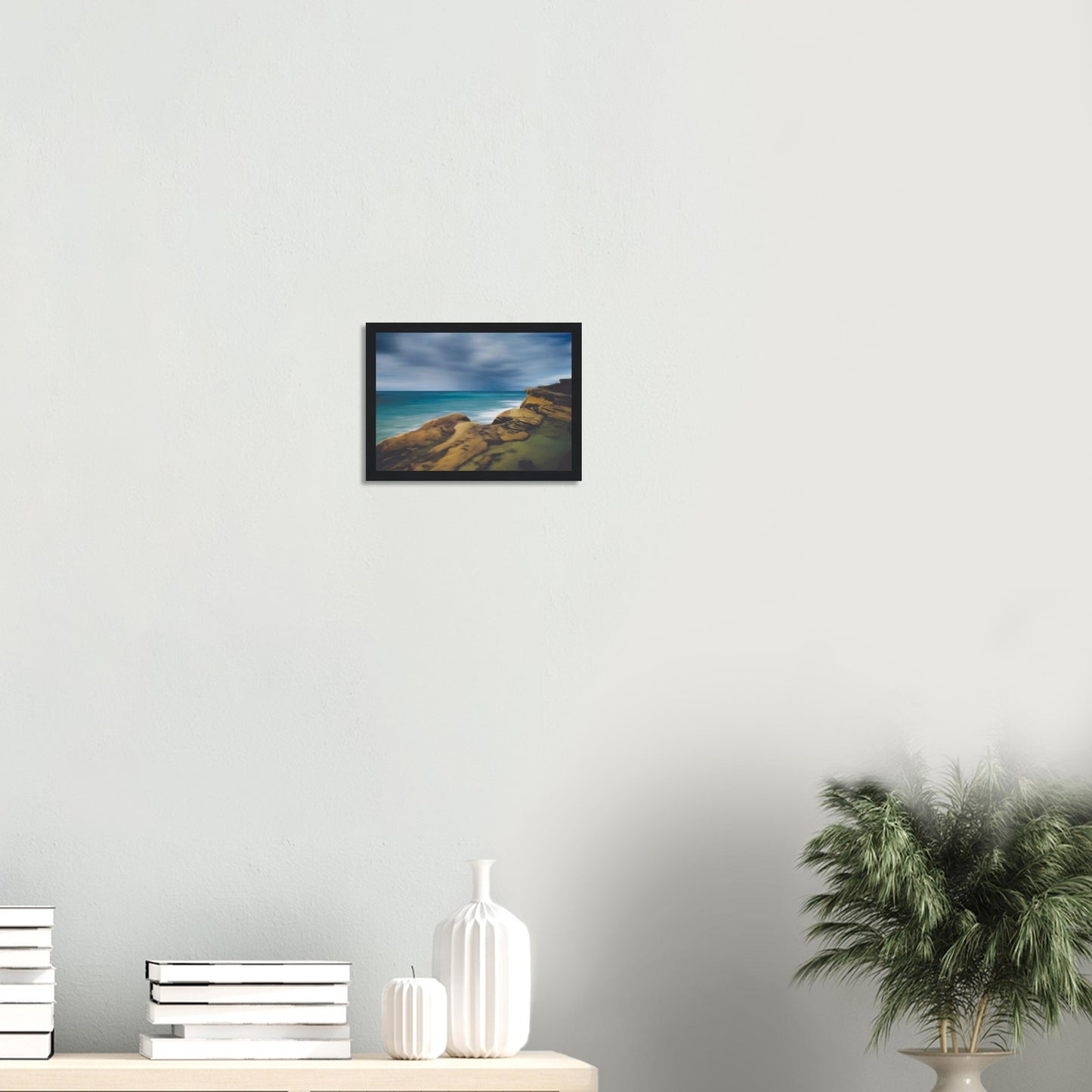 Moody seascape artwork of Castlepoint, with cliffs in the foreground and dark ocean under a brooding sky.