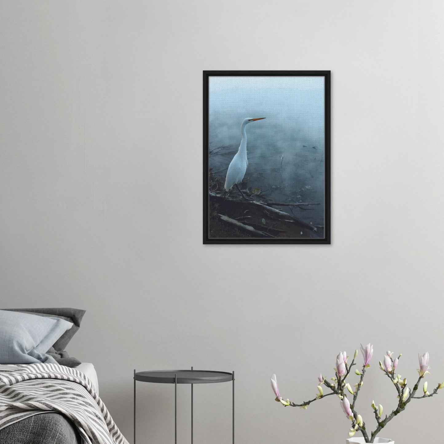 White Heron in the mist captures the quiet elegance of a white heron poised beside mist-covered waters. 