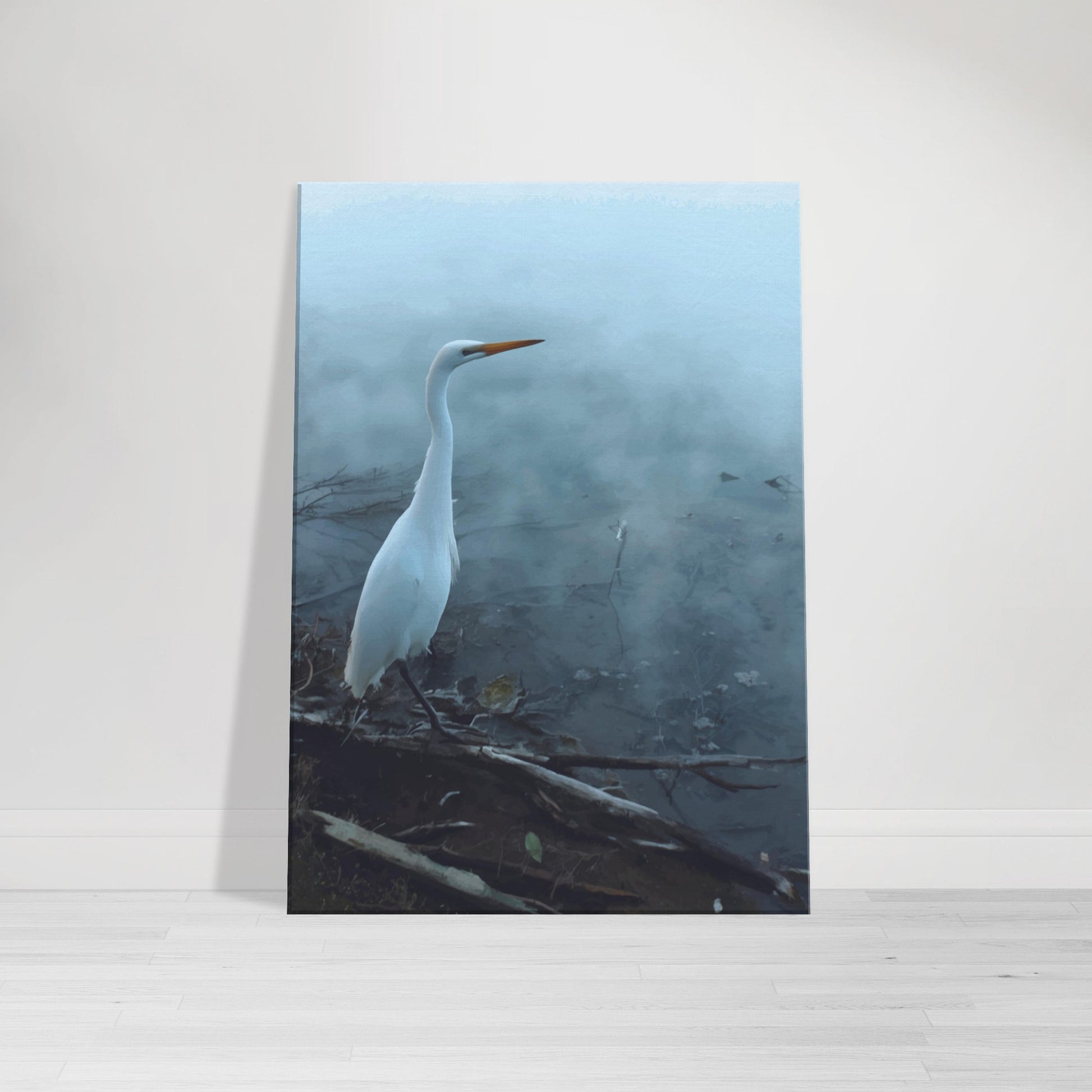 White Heron in the mist captures the quiet elegance of a white heron poised beside mist-covered waters. 