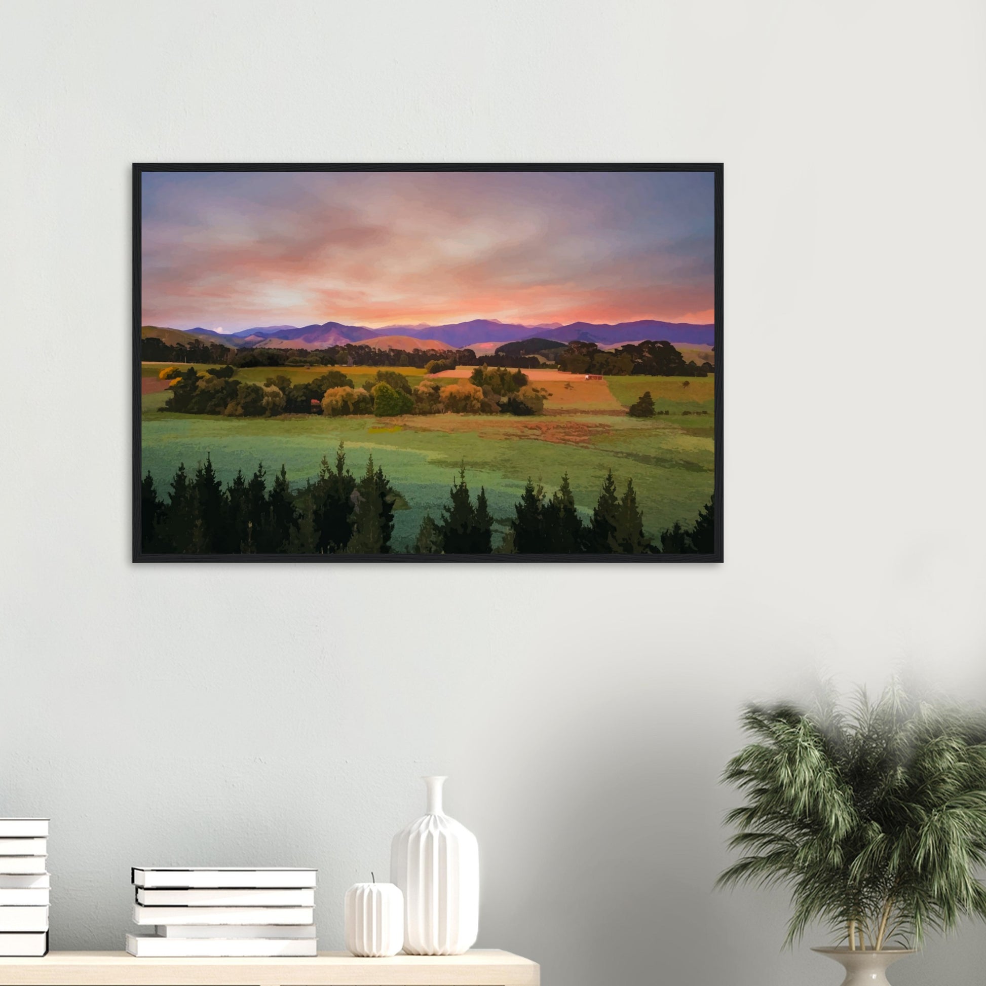 Artwork of a Wairarapa sunrise over pine trees and rolling farmland with soft light on the Tararua Ranges.