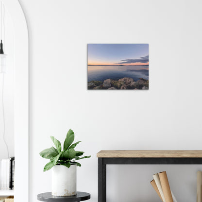 Peaceful Lake Rotorua view with mossy rocks and soft pastel reflections in Calm Waters by NZ artist Ben Hart.