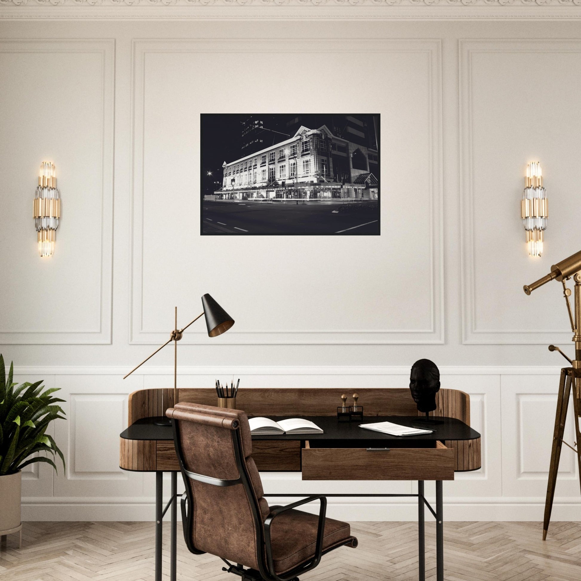 Monochrome artwork of Wellington’s Kirkaldie and Stains building lit at night, showcasing historic architectural details.