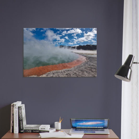 Steaming geothermal pool with bright sky and vivid orange rim in Enchanted Waters by NZ designer Ben Hart.