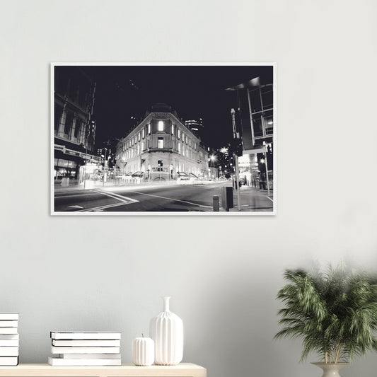 Monochrome artwork of Wellington’s Old Bank Arcade lit up at night, with glowing windows and a classic architectural facade.