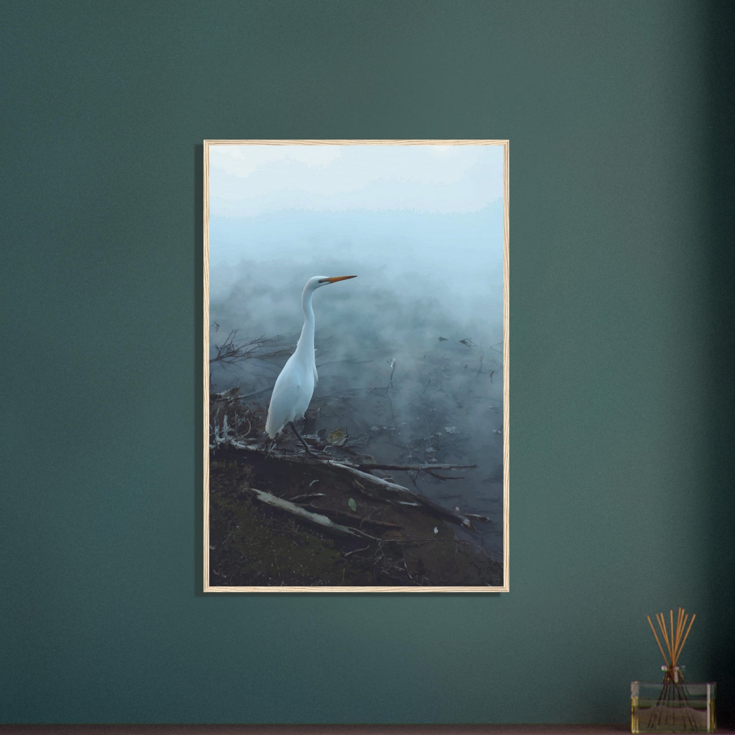 White Heron in the mist captures the quiet elegance of a white heron poised beside mist-covered waters. 
