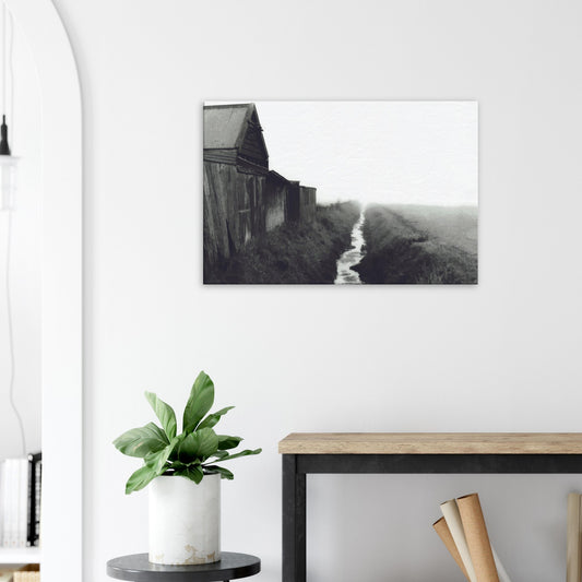 Moody artwork of a rustic barn and misty stream in rural New Zealand, evoking stillness and foggy morning light.