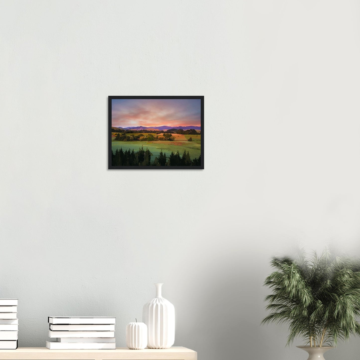 Artwork of a Wairarapa sunrise over pine trees and rolling farmland with soft light on the Tararua Ranges.