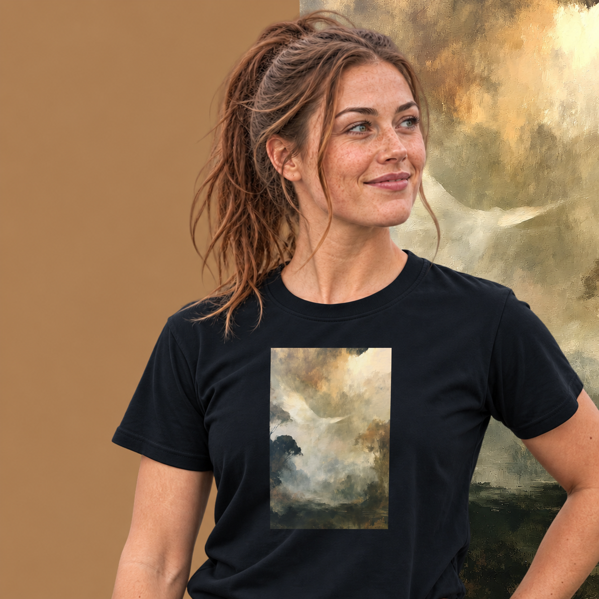 Model wearing the Ascend graphic tee in navy, white dove rising through golden mist print - Blend Designs NZ