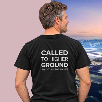 Model wearing the 'Called to higher ground' back print tee in black, large message printed on the back - Blend Designs NZ