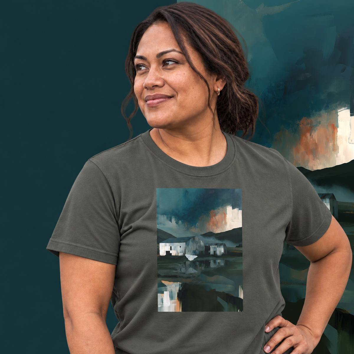 Model wearing the Evening Flight graphic tee in charcoal, farm sheds and stormy evening sky print - Blend Designs NZ