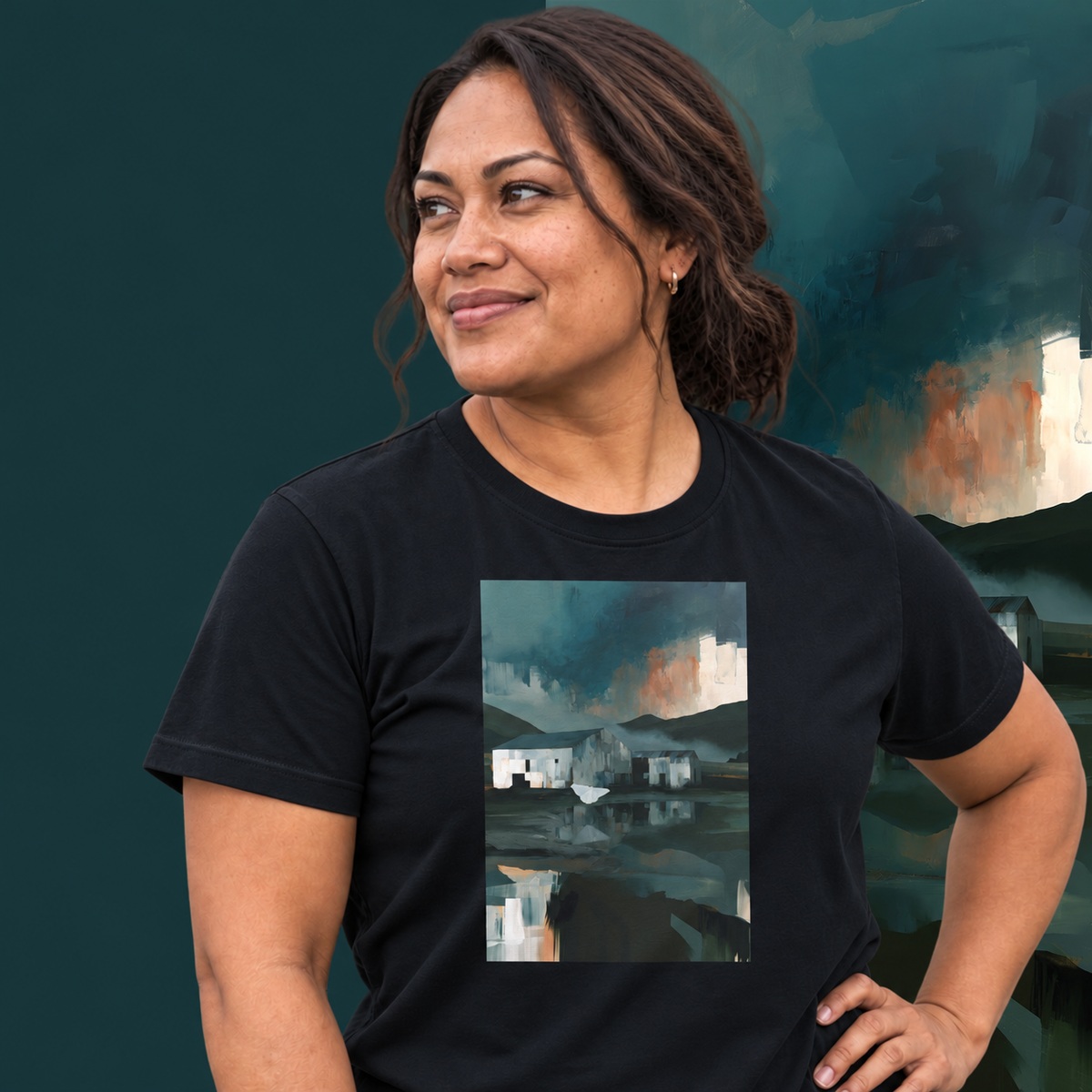 Model wearing the Evening Flight graphic tee in navy, farm sheds and stormy evening sky print - Blend Designs NZ