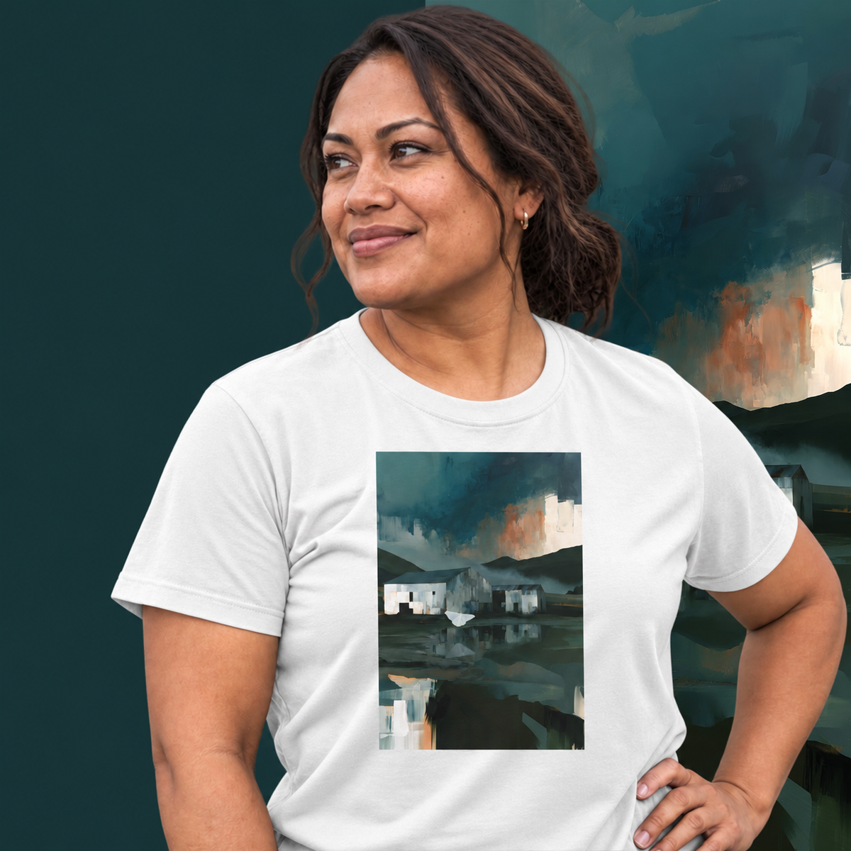 Model wearing the Evening Flight graphic tee in white, farm sheds and stormy evening sky print - Blend Designs NZ
