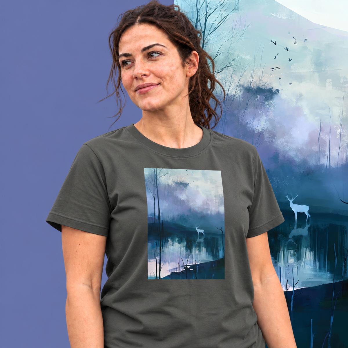 Model wearing the Hart graphic tee in charcoal, white stag and still blue water print - Blend Designs NZ