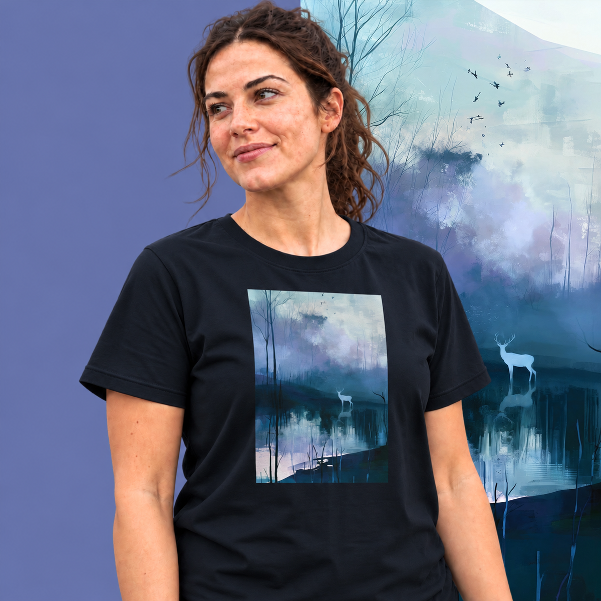 Model wearing the Hart graphic tee in navy, white stag and still blue water print - Blend Designs NZ