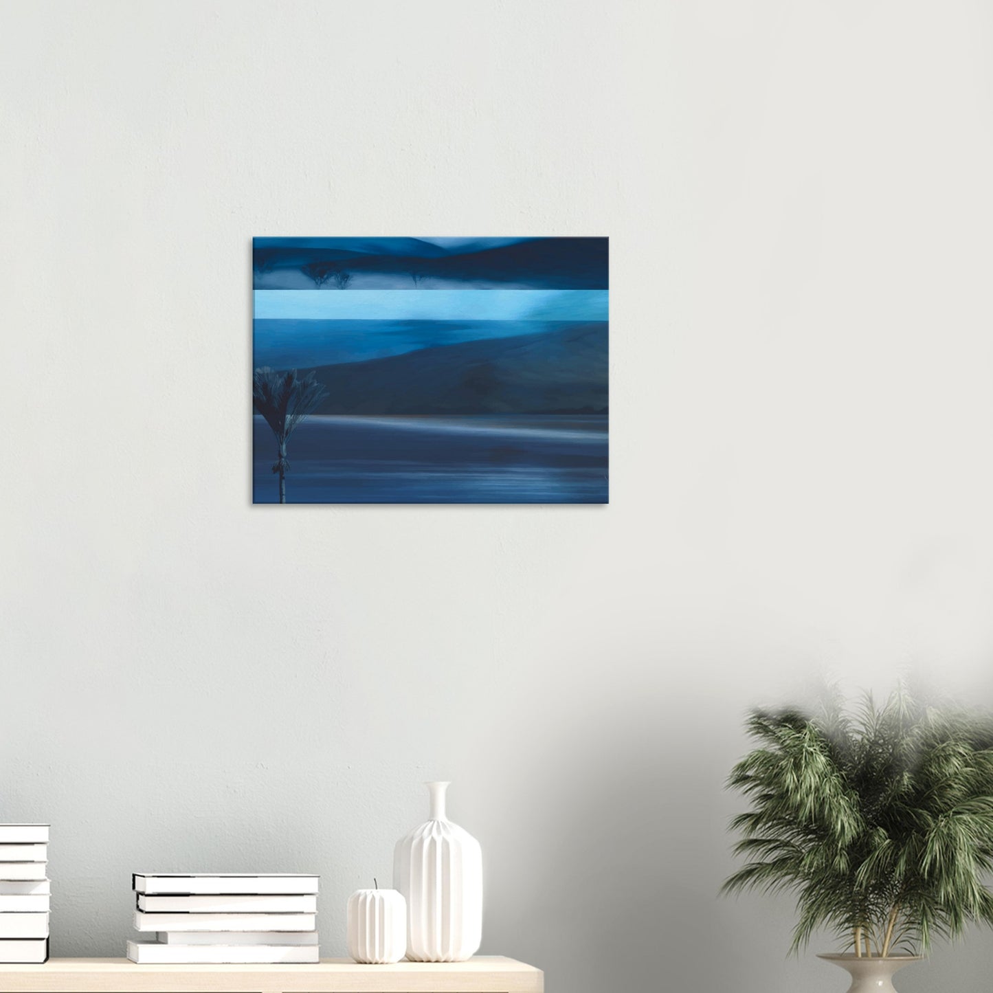 Layered blue seascape artwork with dark hills, water, and horizon in soft coastal tones.