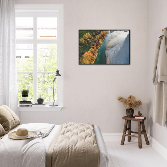 Aerial artwork of a New Zealand river’s edge, with turquoise water, golden trees, and soft shadows.
