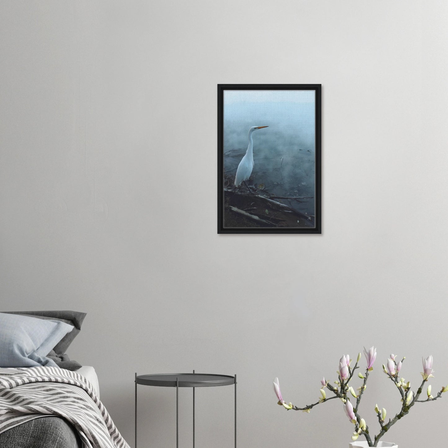 White Heron in the mist captures the quiet elegance of a white heron poised beside mist-covered waters. 