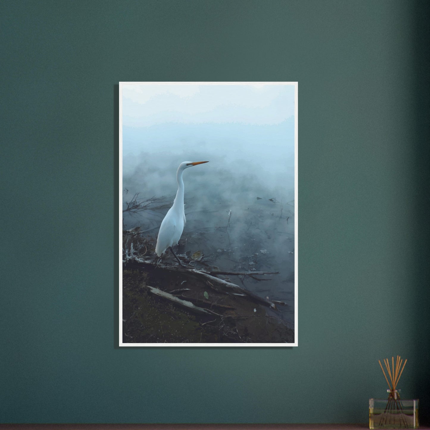White Heron in the mist captures the quiet elegance of a white heron poised beside mist-covered waters. 