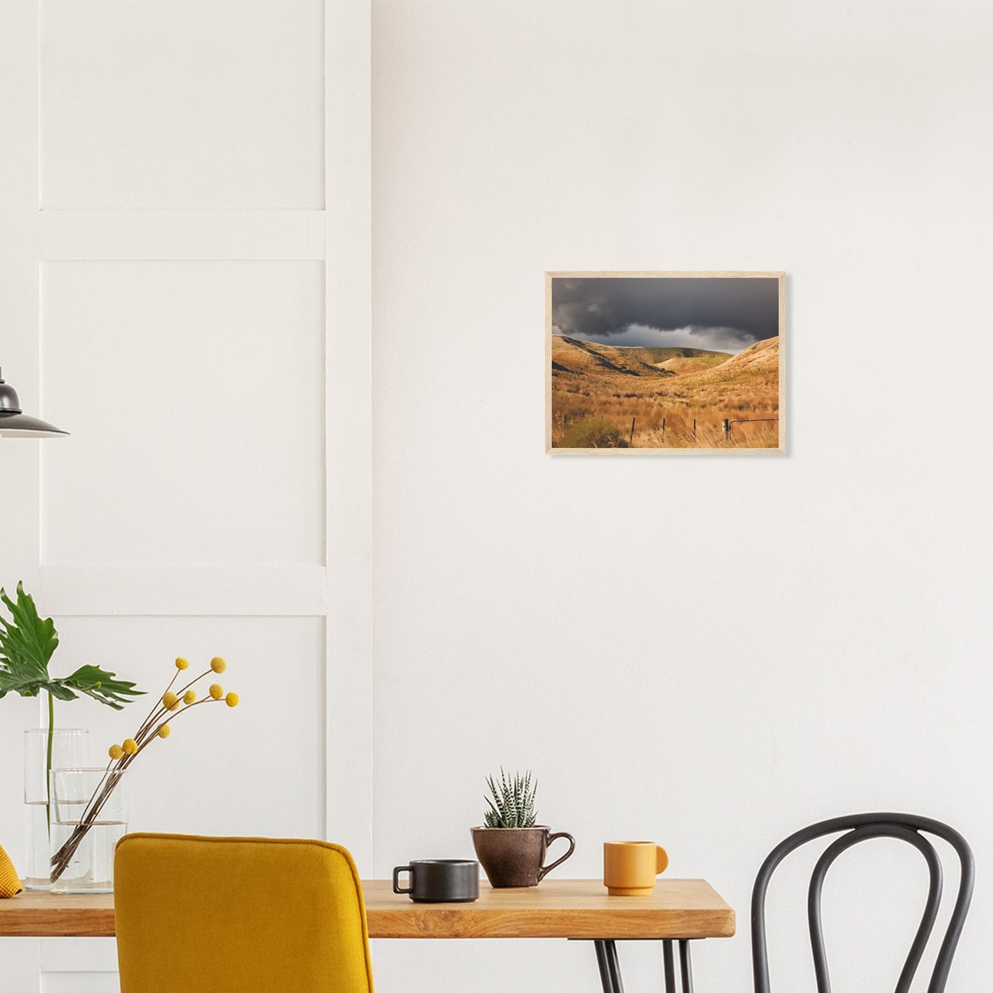 Golden Hawke’s Bay hills beneath dark clouds in a nostalgic NZ landscape artwork titled Trip Home by Ben Hart.