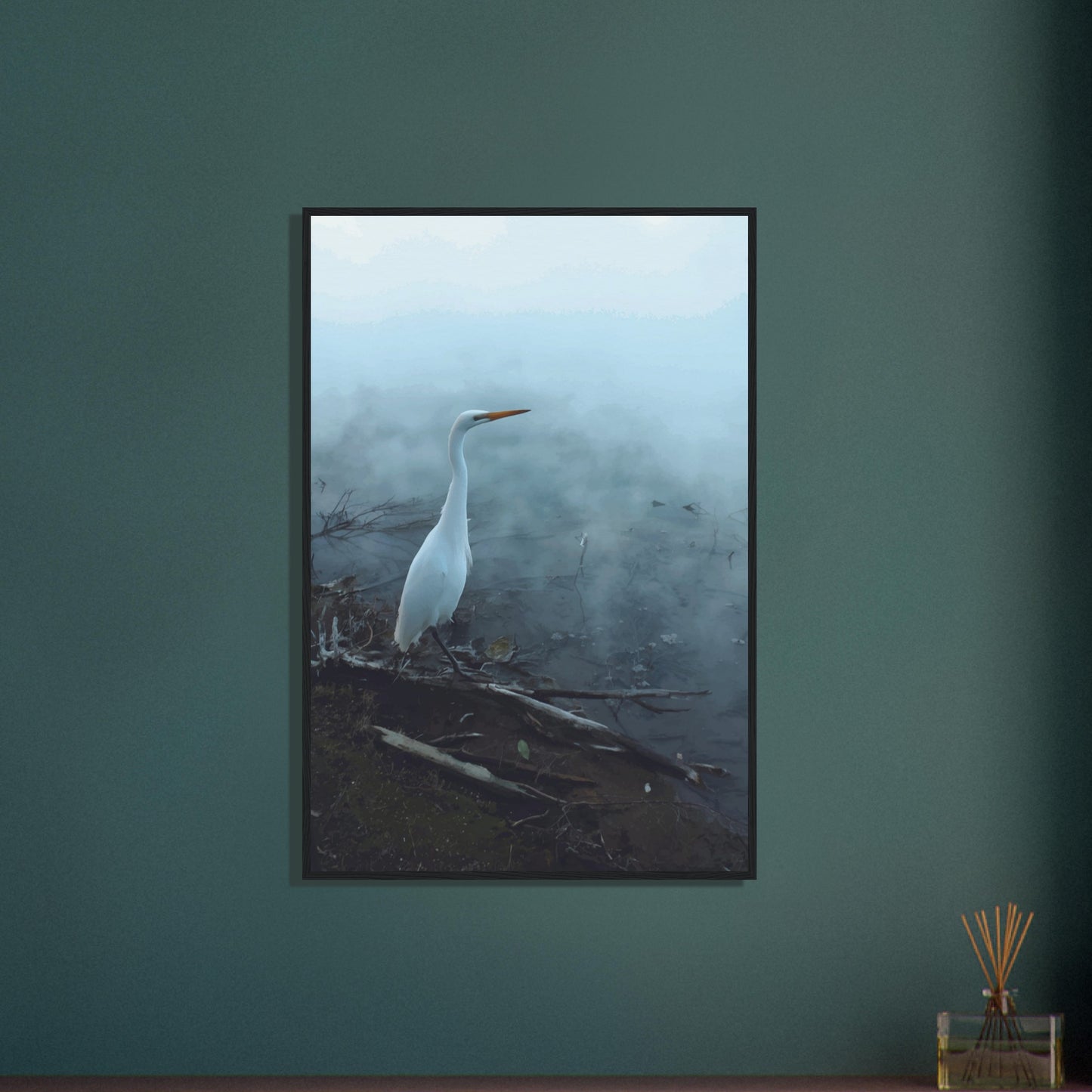White Heron in the mist captures the quiet elegance of a white heron poised beside mist-covered waters. 