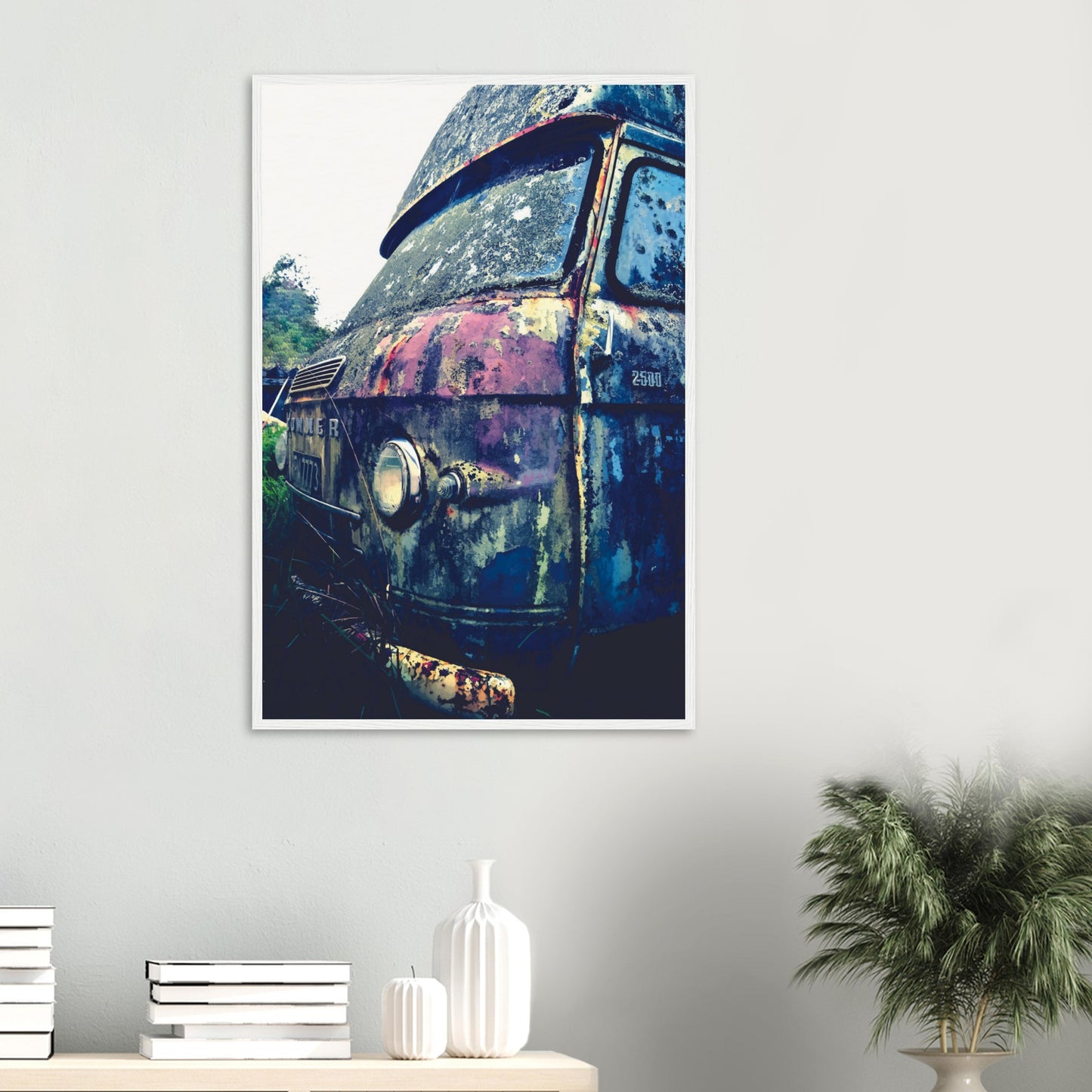 Close-up of a rusted vintage Commer van with textured patina in purple, green and chrome.