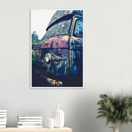 Close-up of a rusted vintage Commer van with textured patina in purple, green and chrome.