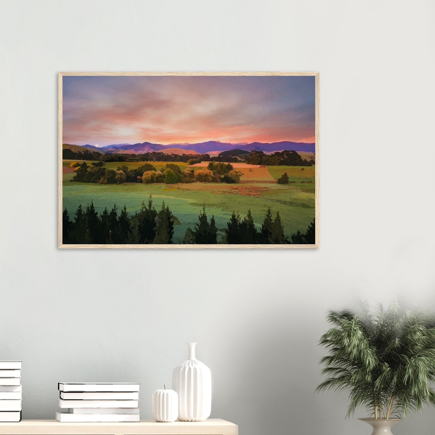 Artwork of a Wairarapa sunrise over pine trees and rolling farmland with soft light on the Tararua Ranges.