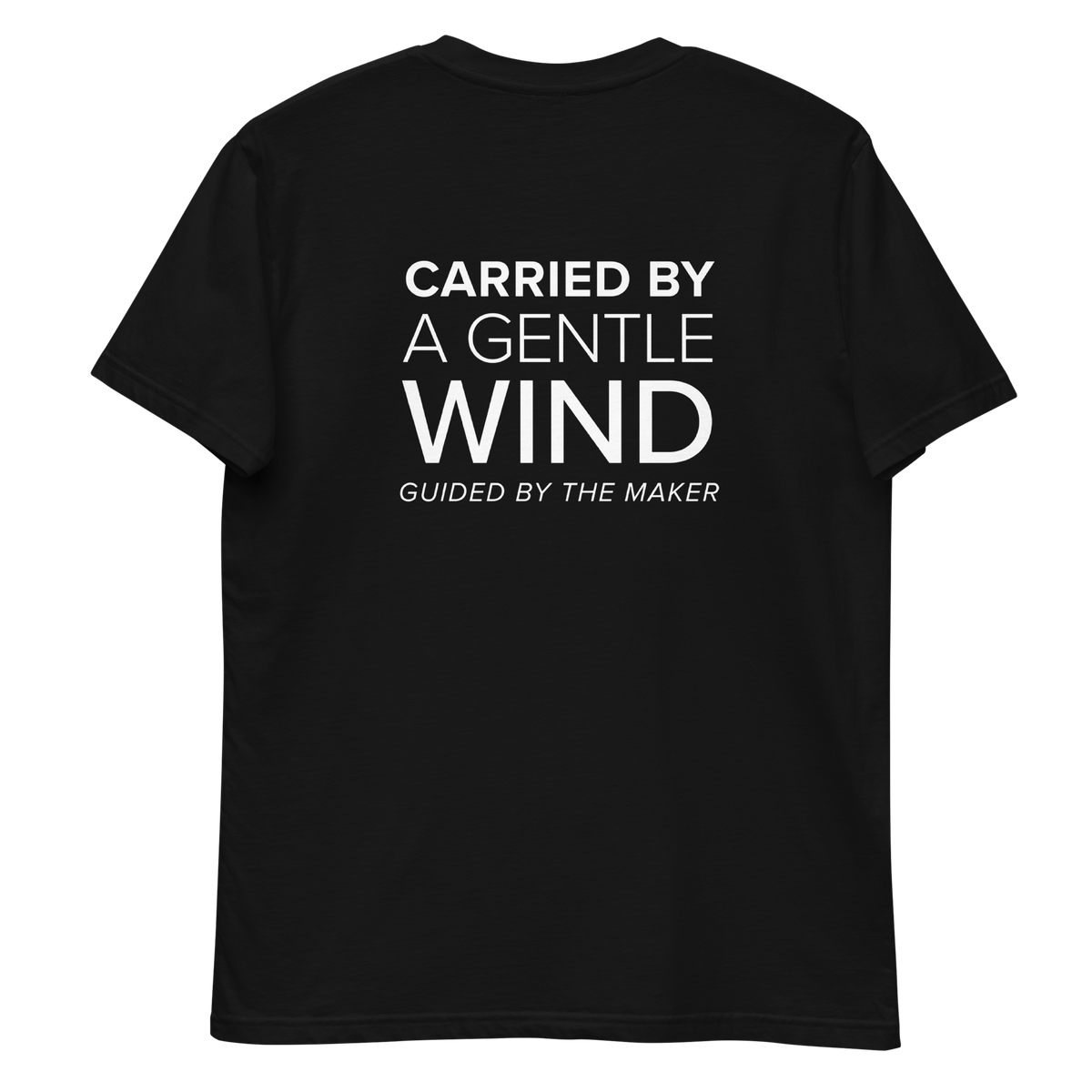 'Carried by a gentle wind' back print tee in black, back view mockup showing the large message print