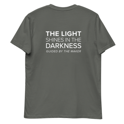'The light shines in the darkness' back print tee in charcoal, back view mockup showing the large message print