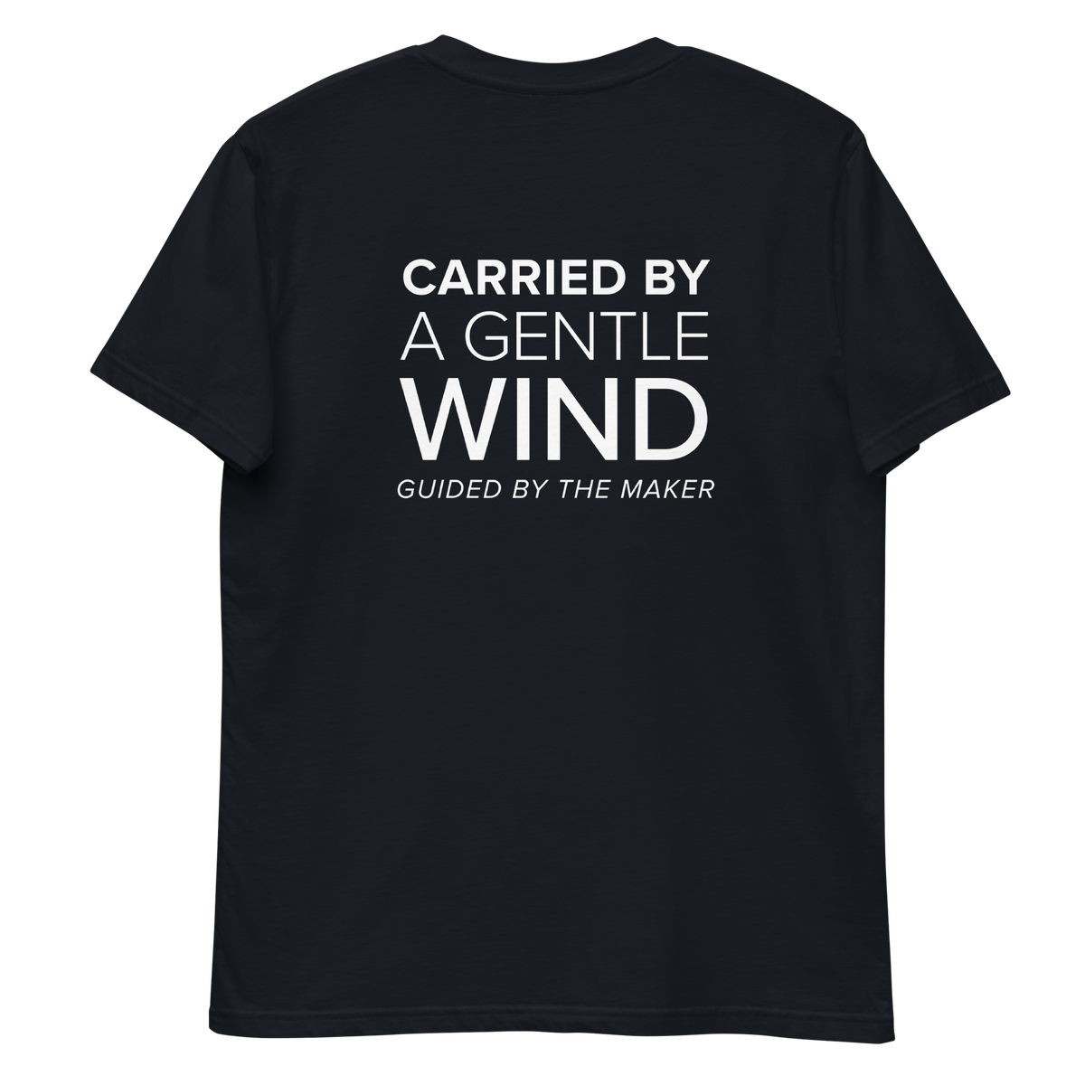 'Carried by a gentle wind' back print tee in navy, back view mockup showing the large message print