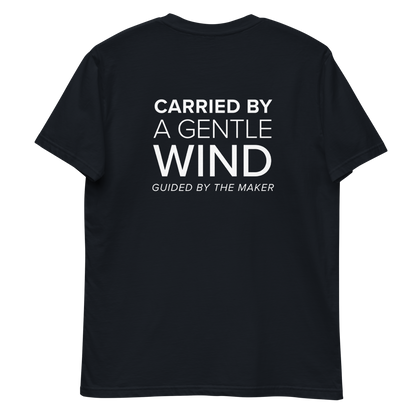 'Carried by a gentle wind' back print tee in navy, back view mockup showing the large message print
