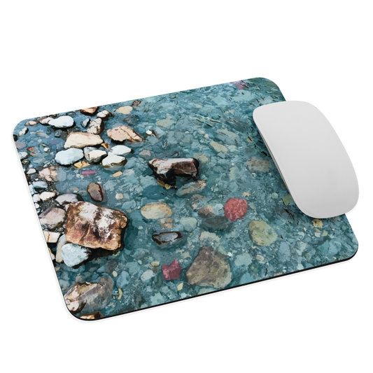 Washed Away designer mouse pad with abstract river stone artwork in earthy blues and natural tones.