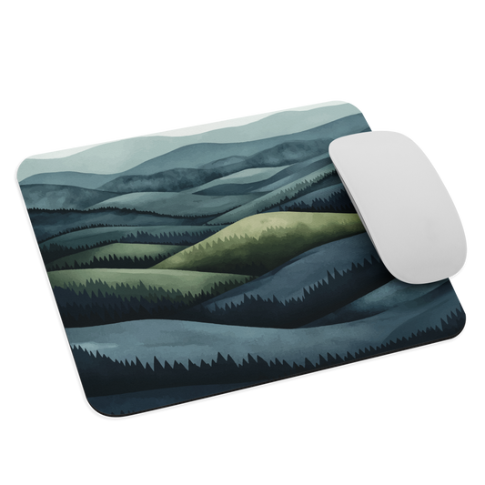 Mouse pad with layered mountain and forest landscape in blue and green hues