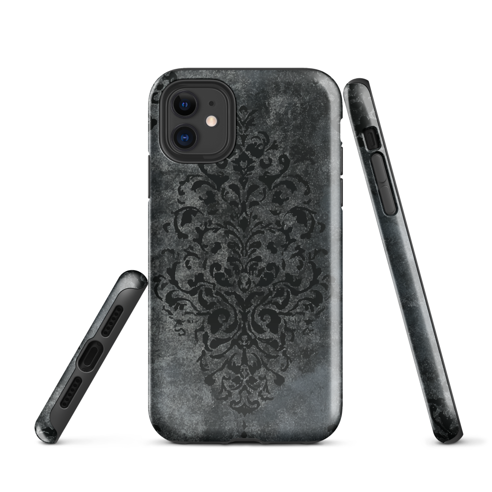 Dark damask patterned phone case with a vintage gothic aesthetic and textured stone background.
