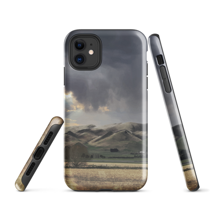 Designer phone case with NZ landscape painting of Te Hauke and cloudy skies by Ben Hart.