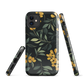 NZ Kowhai phone case with native yellow floral and green leaves on black background by designer Ben Hart.