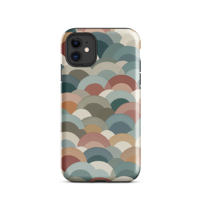A soft retro-inspired phone case featuring layered arc shapes in warm, earthy tones.