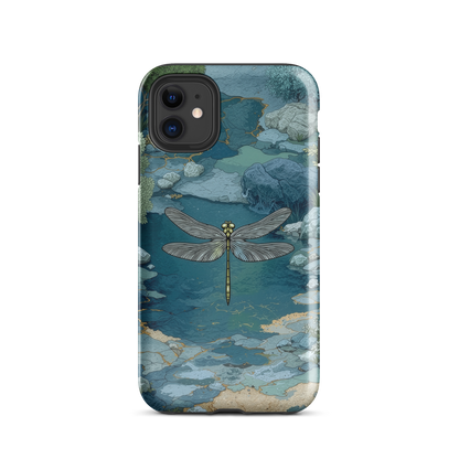 Nature-inspired phone case featuring a dragonfly over calm water with blue and green forest tones.