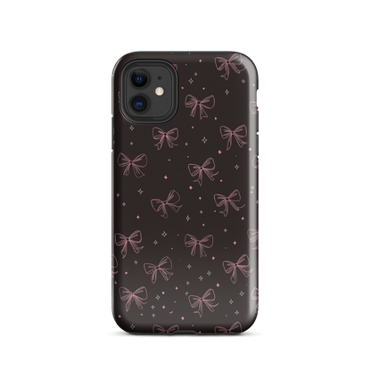 Midnight Bow seamless repeat pattern — pink hand-drawn ribbon bows and sparkle stars on a black background